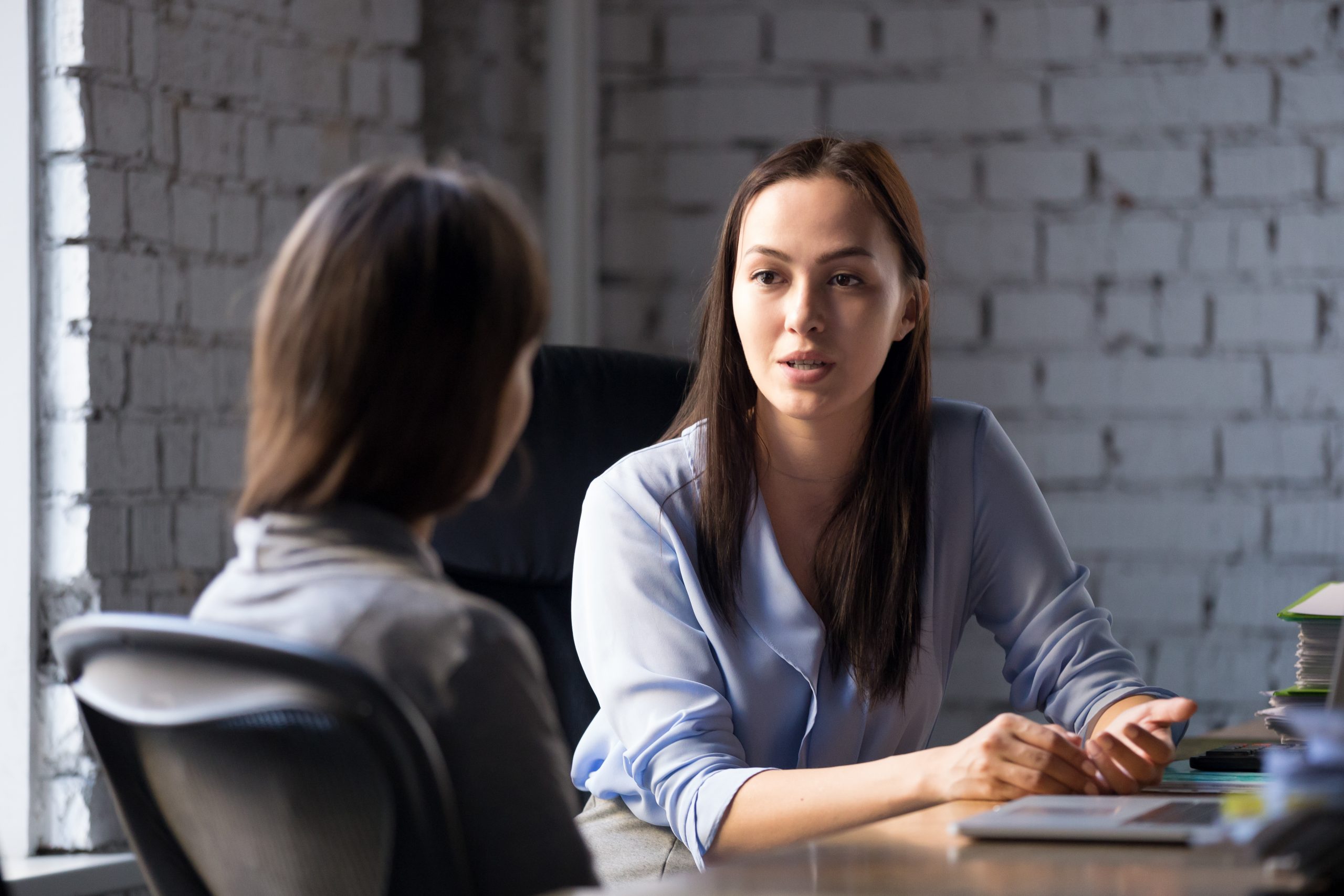 Serious,Professional,Female,Advisor,Consulting,Client,At,Meeting,Talking,Having